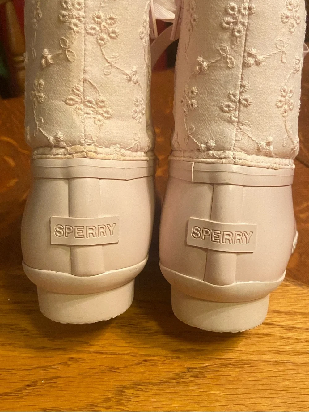 Sperry Girls powder pink lace-up all weather duck boots.
